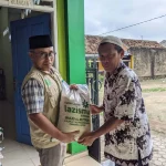 LAZISMU Al-Muttaqin Pringsewu Selatan Salurkan 400 Kg Beras untuk Mustahik